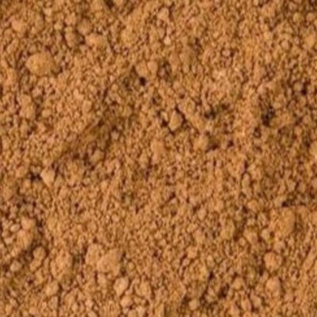 Almond Setting Powder swatch shown with finely milled matte texture for blurring pores and controlling shine.