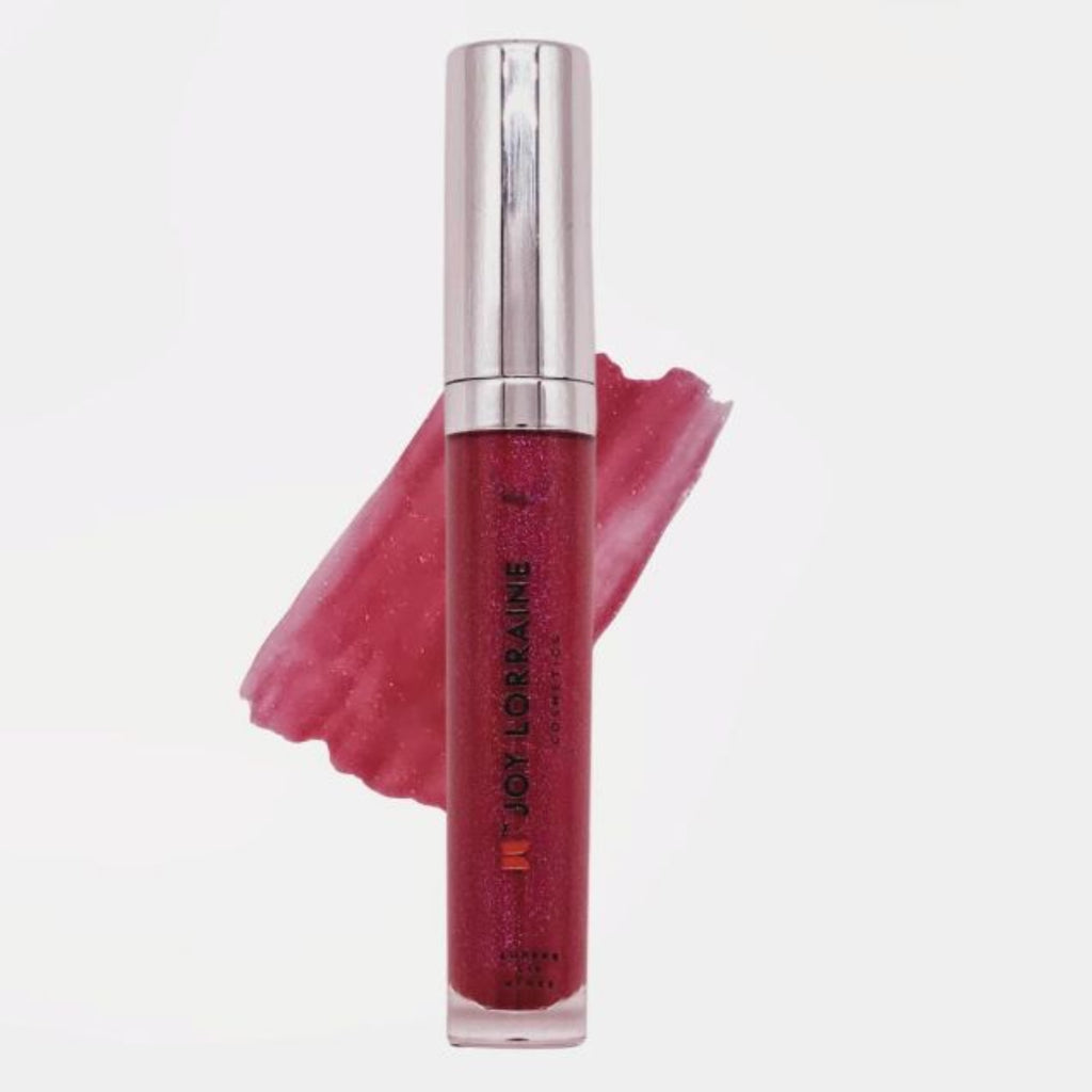 Berry vegan lip gloss with high-shine, non-sticky finish shown with swatch designed to complement melanin-rich skin tones.
