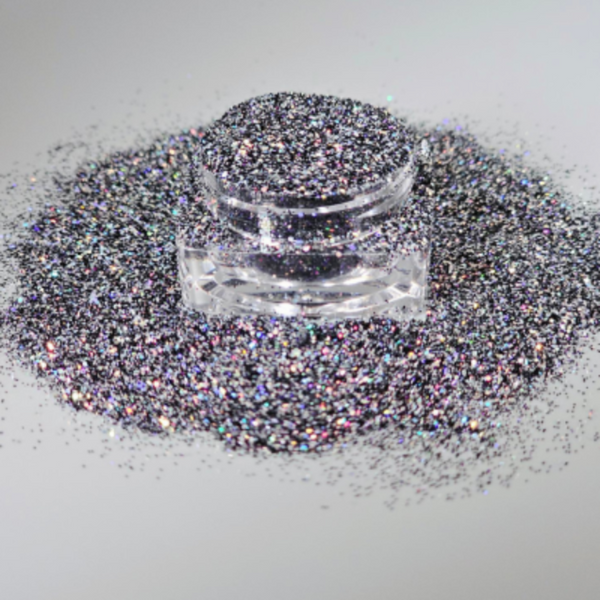 Loose cosmetic grade glitter mix in open jar with intense sparkles for bold eye looks, face glitter makeup looks, glitter lips and body art.