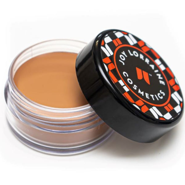 Open jar of lightweight, buildable cream foundation showing shade for even-tone coverage and radiant glow.