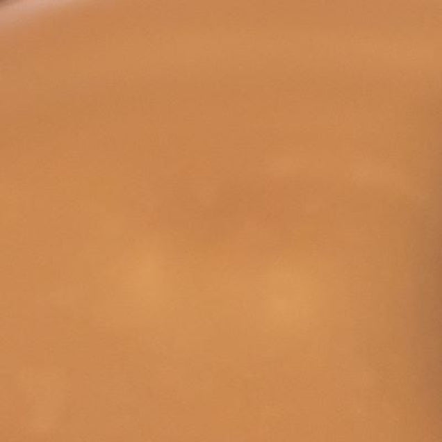 Swatch of buildable cream foundation showing shade for even-tone coverage and radiant glow. 