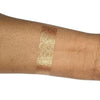 Caribe loose shimmer powder swatch showing radiant bronze highlighter for face and body.