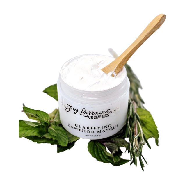 Open jar of Clarifying Camphor Masque formulated for oily and acne-prone skin.  
