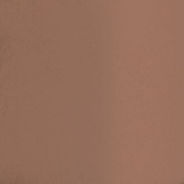 Swatch of full coverage orange base cream foundation makeup designed to complement melanin-rich skin.