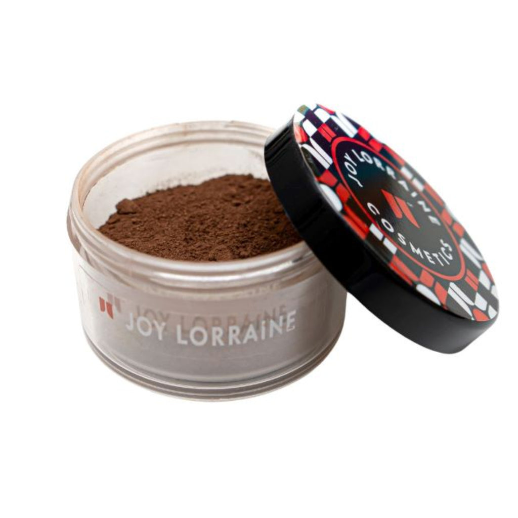 Deep Ebony Setting Powder shown in open jar with finely milled matte texture for blurring pores and controlling shine.