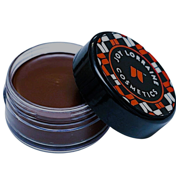 Evening Chocolate Caribe Cream Foundation in open jar with creamy formula for smooth even-tone coverage.
