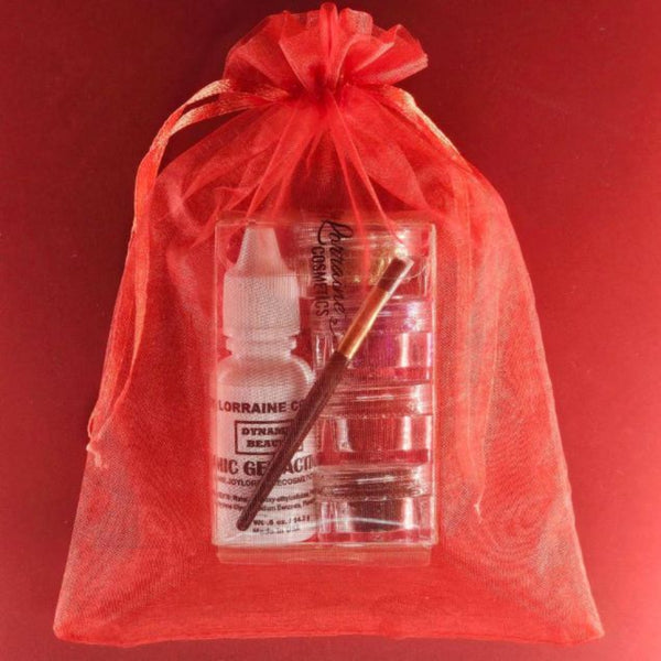 Four cosmetic-grade loose glitters, vegan glitter makeup glue, and mini brush for eyes, face, and body makeup in a red sheer drawstring bag.