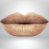 Gold liquid matte lipstick swatch with high pigment and a smooth transfer-resistant finish designed to complement melanin-rich skin tones.