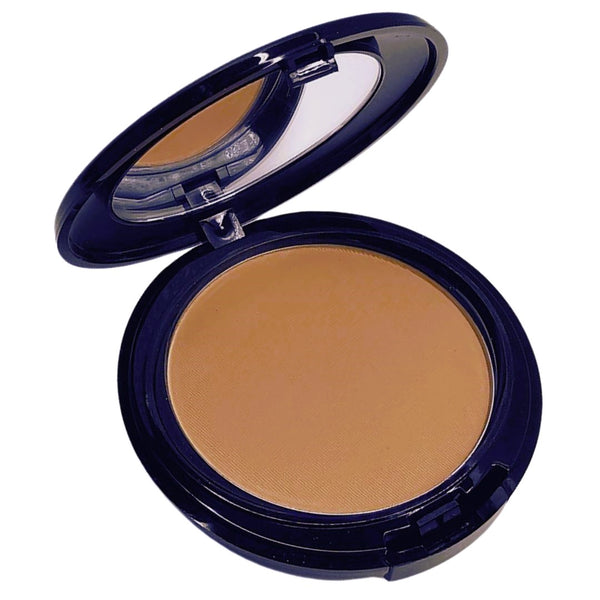 Open compact with golden honey powder foundation with hidden sponge applicator in Mustique shade.
