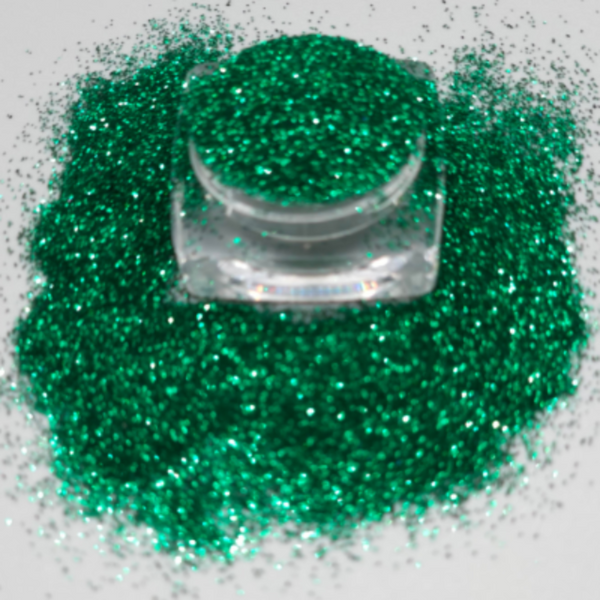 Loose cosmetic grade glitter in open jar with intense sparkles for bold eye looks, face glitter makeup looks, glitter lips and body art.