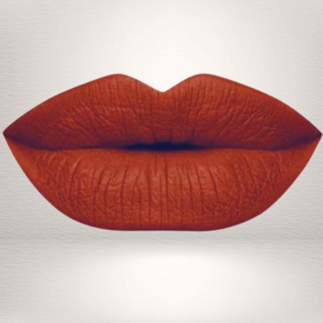 Close-up of lips wearing Indigenous Burnt Orange Liquid Lipstick - San Juan in burnt orange matte, smudge-resistant, long-lasting color.