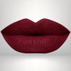 Close-up of liquid matte lipstick with high pigment and a smooth, transfer-resistant finish designed to wear beautifully on melanin-rich skin.