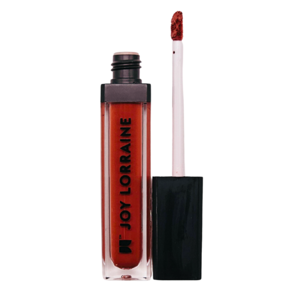Liquid matte lipstick in burnt orange shade with long-wear, smudge-resistant matte finish.
