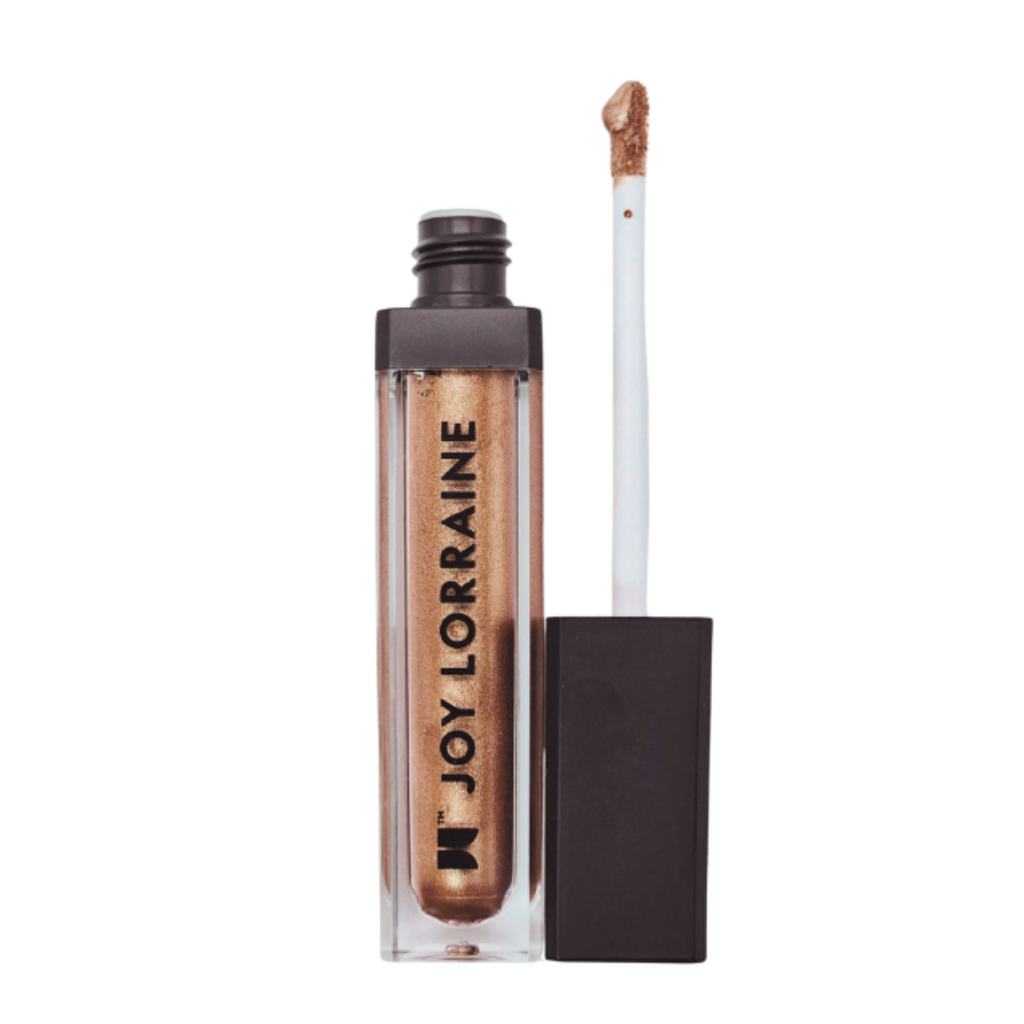 Liquid matte lipstick in metallic gold shade with long-wear, smudge-resistant matte finish.