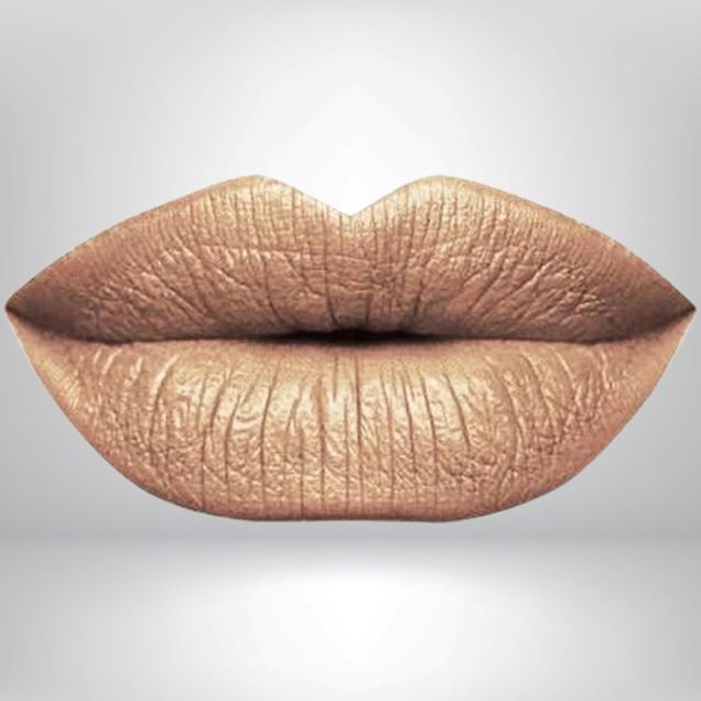 Close-up of lips in metallic gold shade with long-wear, smudge-resistant matte finish.