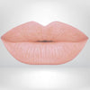 Close-up of lips in peach shade with long-wear, smudge-resistant matte finish.