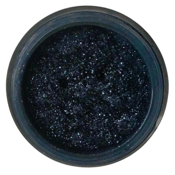 Navy loose eye shimmer showing radiant shimmer for glamour looks.