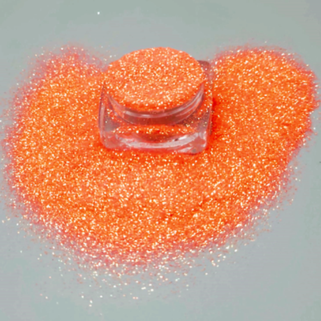 Bright Orange loose glitter - Candy in open jar with ultrafine cosmetic-grade glitter for eyes, face, lips and body. 
