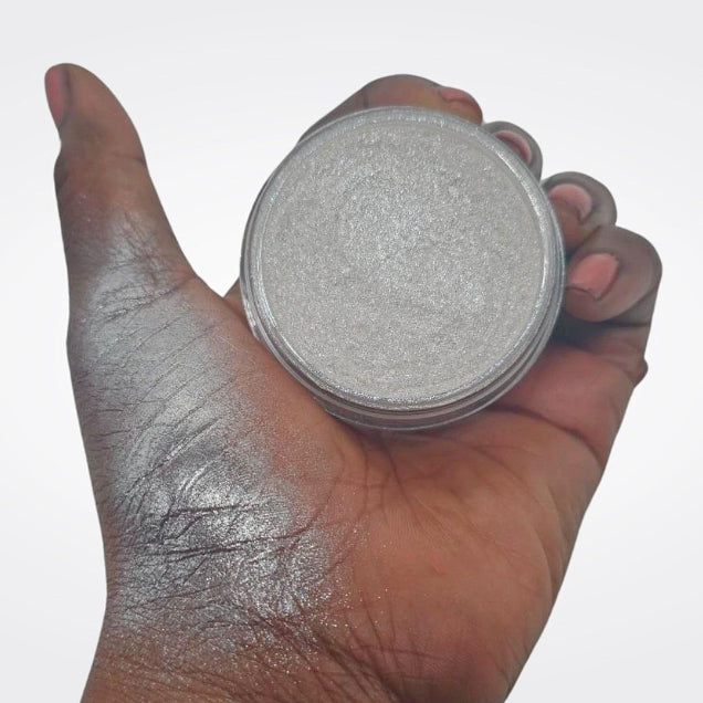 Loose White Highlighter - ChaGLOWnas  in open jar with hand swatch showing bright white highlighter makeup for face and body. 