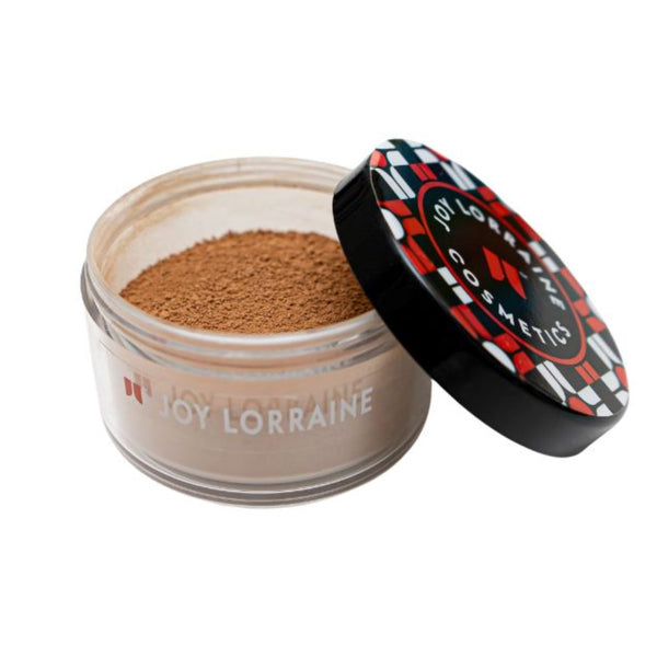 Open jar of Almond loose setting powder with lid on the side, showing soft matte texture that blurs fine lines and controls shine.