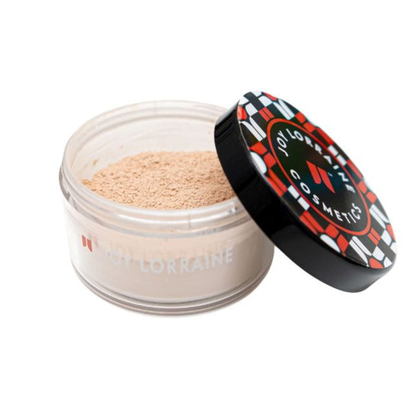 Open jar of Butternut loose setting powder with lid on the side, showing soft matte texture that blurs fine lines and controls shine.