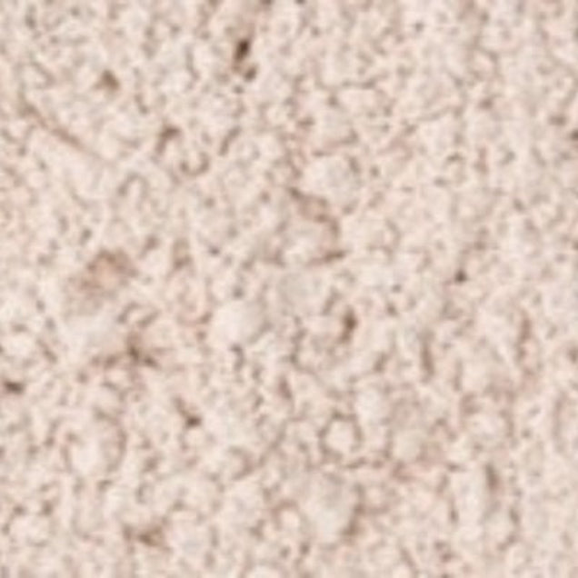 Translucent loose setting powder with a soft matte texture that blurs fine lines, controls shine, and sets makeup for long-lasting, flawless wear.