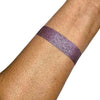 Swatch of loose plum shimmer eyeshadow with ultrafine pigments for radiant, buildable color payoff. 