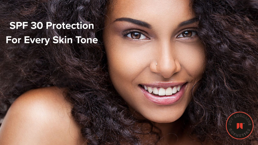 Model wearing broad-spectrum SPF 30 sunscreen suitable for all skin tones.
