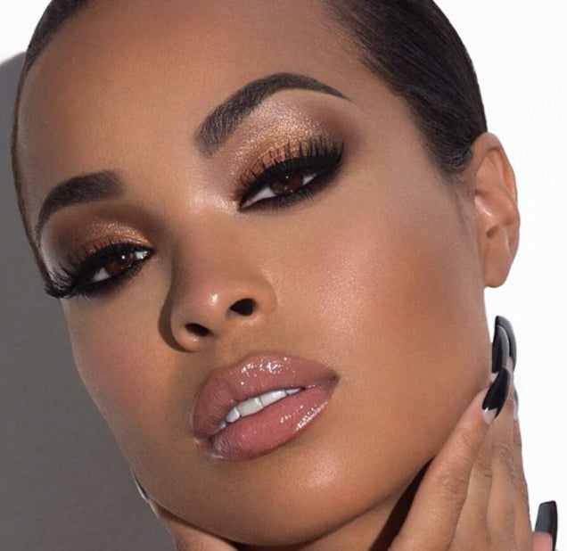 Model wearing Neutral 120-shade Eyeshadow Palette in warm and cool tones for everyday eye makeup looks.