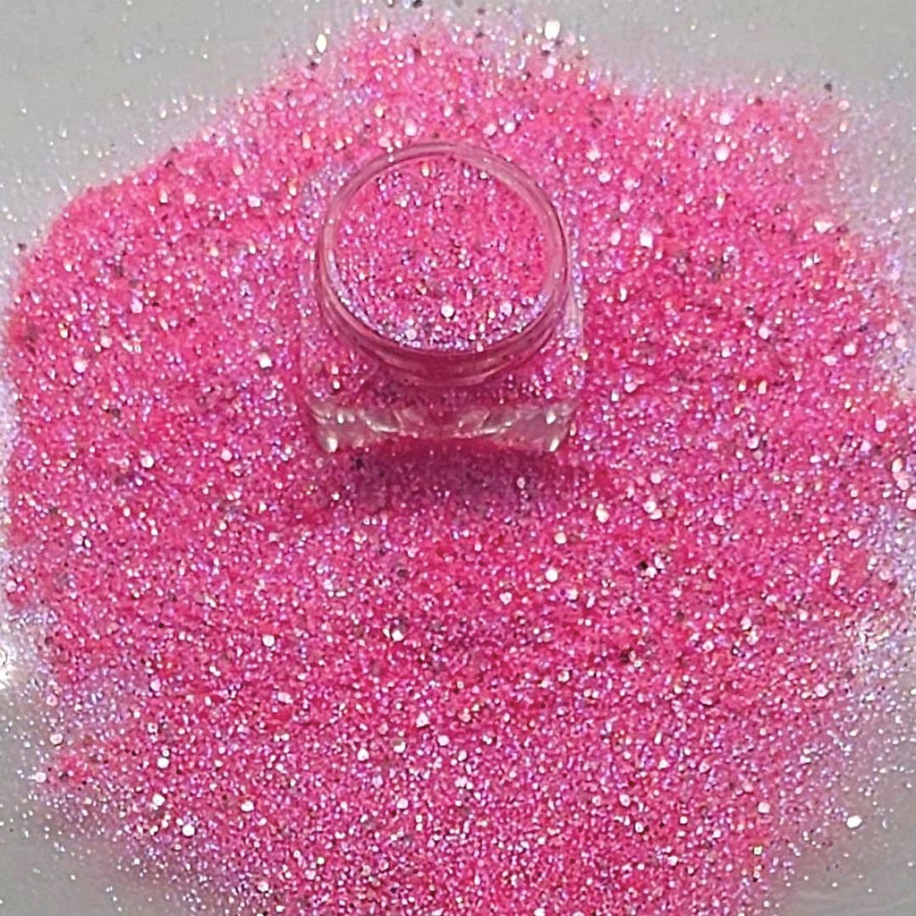 Loose cosmetic grade glitter mix in open jar with intense sparkles for bold eye looks, face glitter makeup looks, glitter lips and body art.