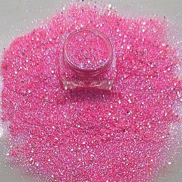 Loose cosmetic grade glitter mix in open jar with intense sparkles for bold eye looks, face glitter makeup looks, glitter lips and body art.