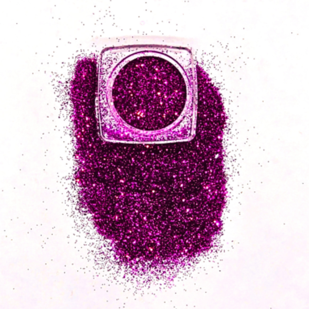 Loose cosmetic grade glitter in open jar with intense sparkles for bold eye looks, face glitter makeup looks, glitter lips and body art.