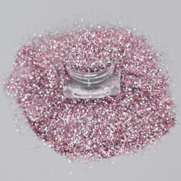 Loose cosmetic grade glitter in open jar with intense sparkles for bold eye looks, face glitter makeup looks, glitter lips and body art.