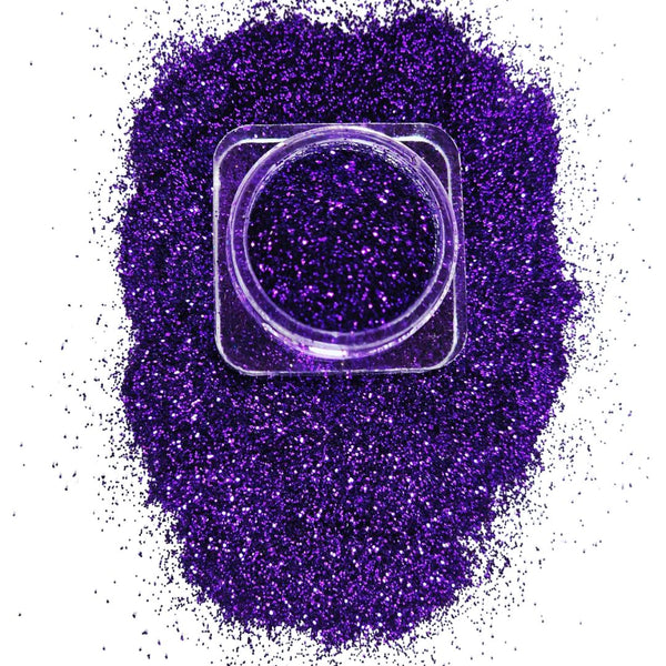 Cosmetic grade loose glitter in open jar with intense sparkles for bold eye looks, face glitter makeup looks, glitter lips and body art.