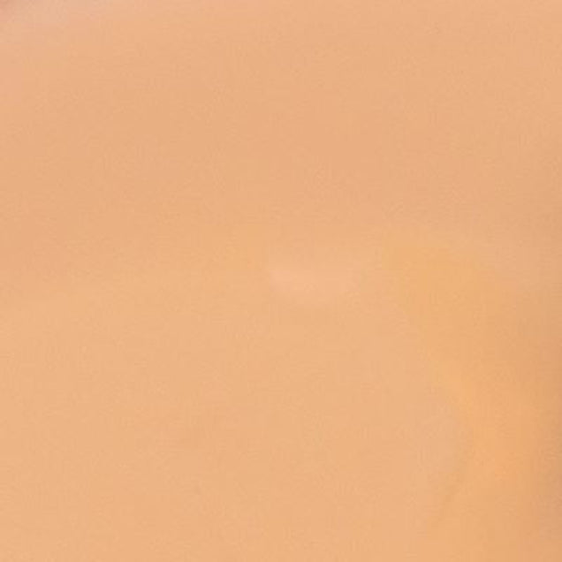 Swatch Rich Tan in open jar with creamy formula for smooth even-tone coverage.

