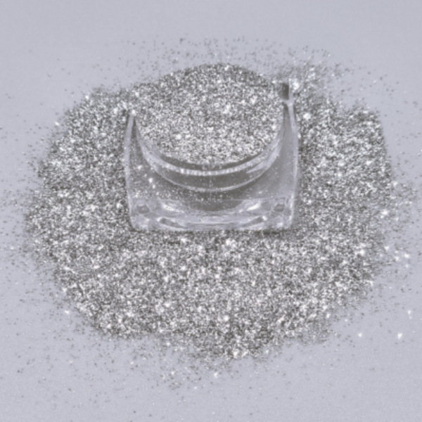Cosmetic grade loose glitter in open jar with intense sparkles for bold eye looks, face glitter makeup looks, glitter lips and body art.