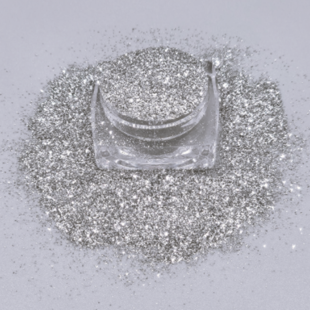 Cosmetic grade loose glitter in open jar with intense sparkles for bold eye looks, face glitter makeup looks, glitter lips and body art.