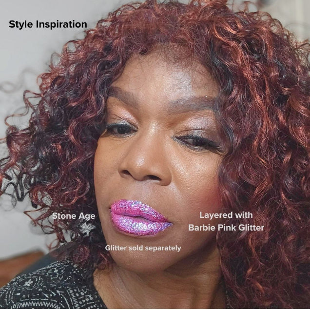 Stone Age Gray Waterproof Liquid Lipstick layered with Barbie Pink Glitter to create a sparkling lip look.
