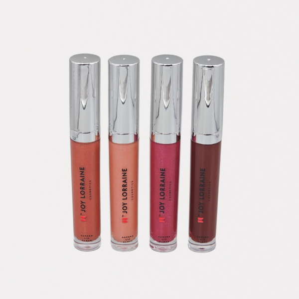 Set of four vegan, high-shine, non-sticky lip glosses designed to complement melanin-rich skin tones. 