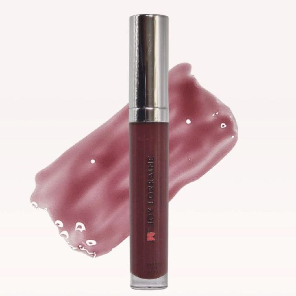 Mauve vegan lip gloss with high-shine, non-sticky finish shown with swatch designed to complement melanin-rich skin.