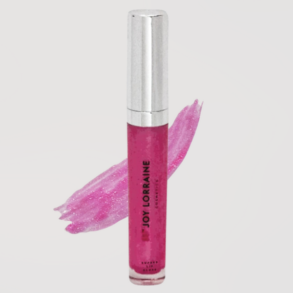 Pink vegan lip gloss with high-shine, non-sticky finish shown with swatch designed to complement melanin-rich skin.