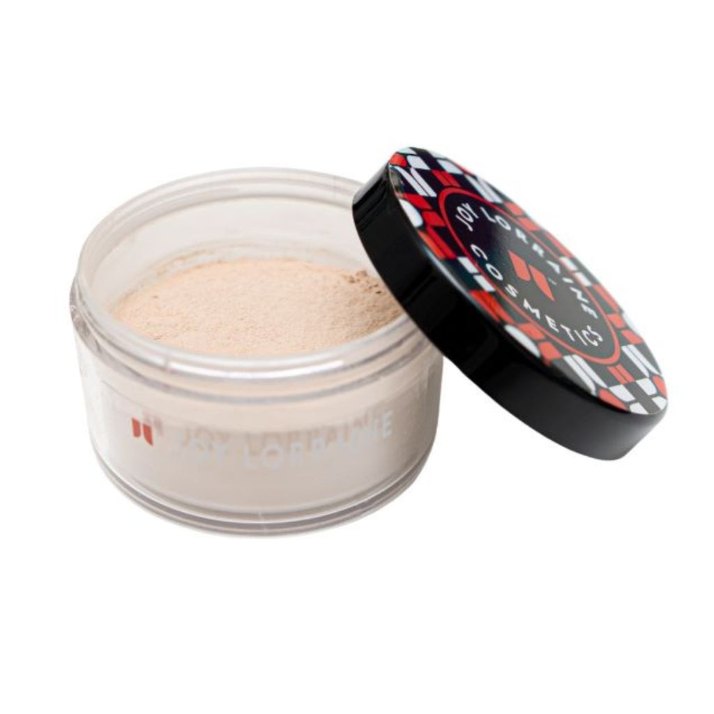 Lokono Setting Powder shown in open jar with finely milled matte texture for blurring pores and controlling shine.