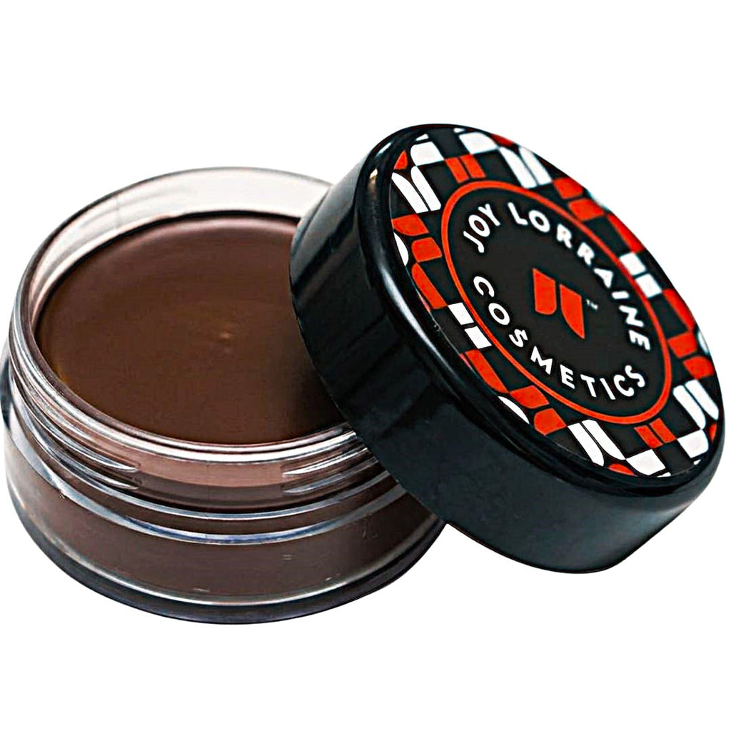 Twilight Chocolate Caribe Cream Foundation in open jar with creamy formula for smooth even-tone coverage.
