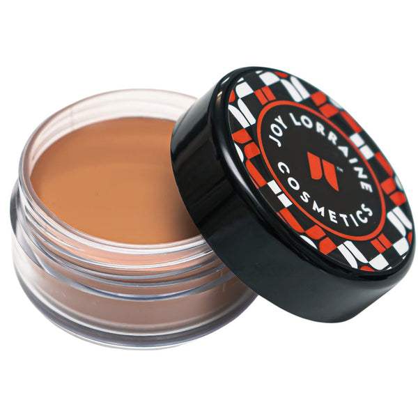 Walnut Caribe Cream Foundation in open jar with creamy formula for smooth even-tone coverage.
