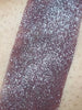 Swatch of loose shimmer eyeshadow with buildable pigments for bold color payoff. 