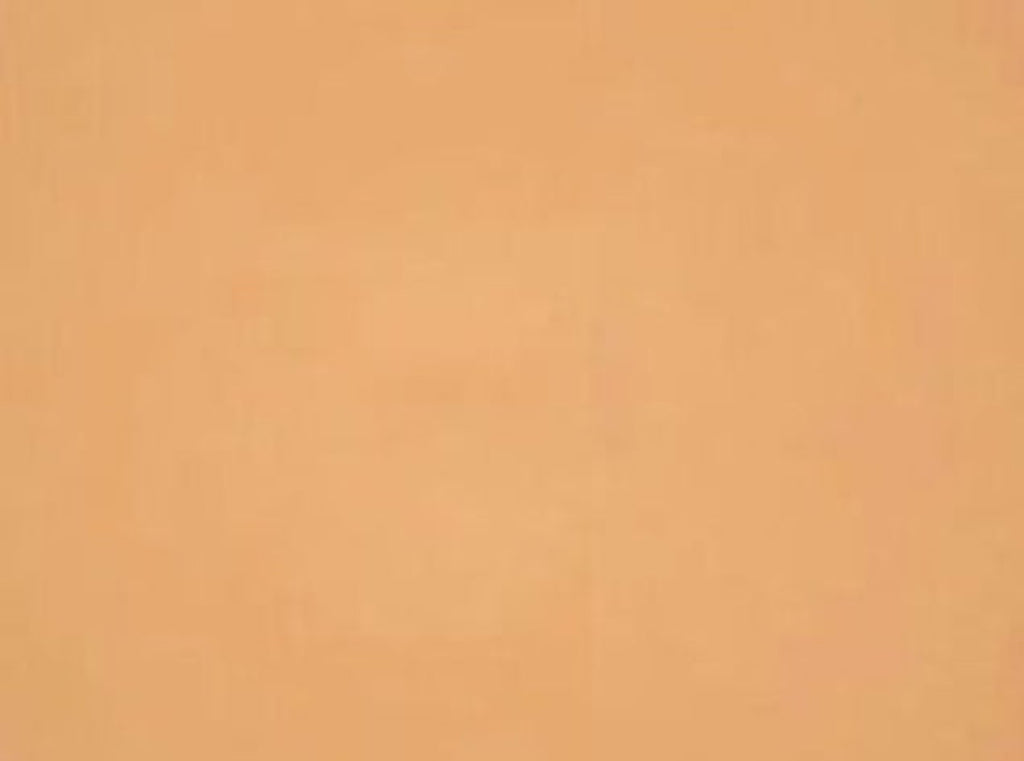 Swatch of Golden Honey powder foundation shade from the Dual Mustique compact, showing true color and matte finish. 